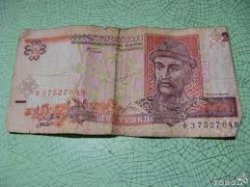 The Ukrainian hryvnia will drop to 10 per dollar