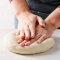 Like preparing dough for pizza, like in a pizzeria